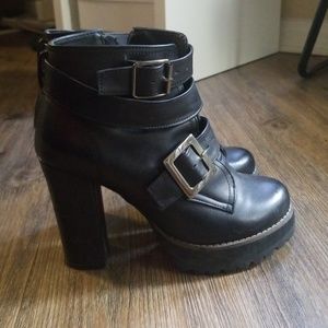 Black booties with buckles